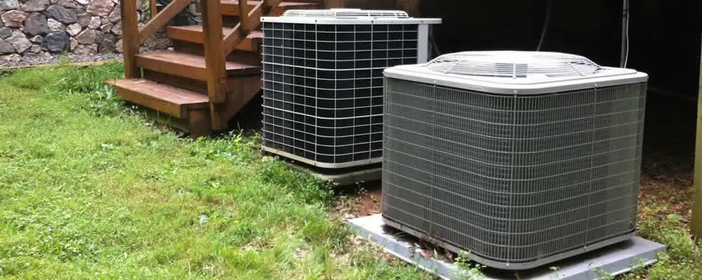 Heat pump installation and service units outside a home in Hartford, CT